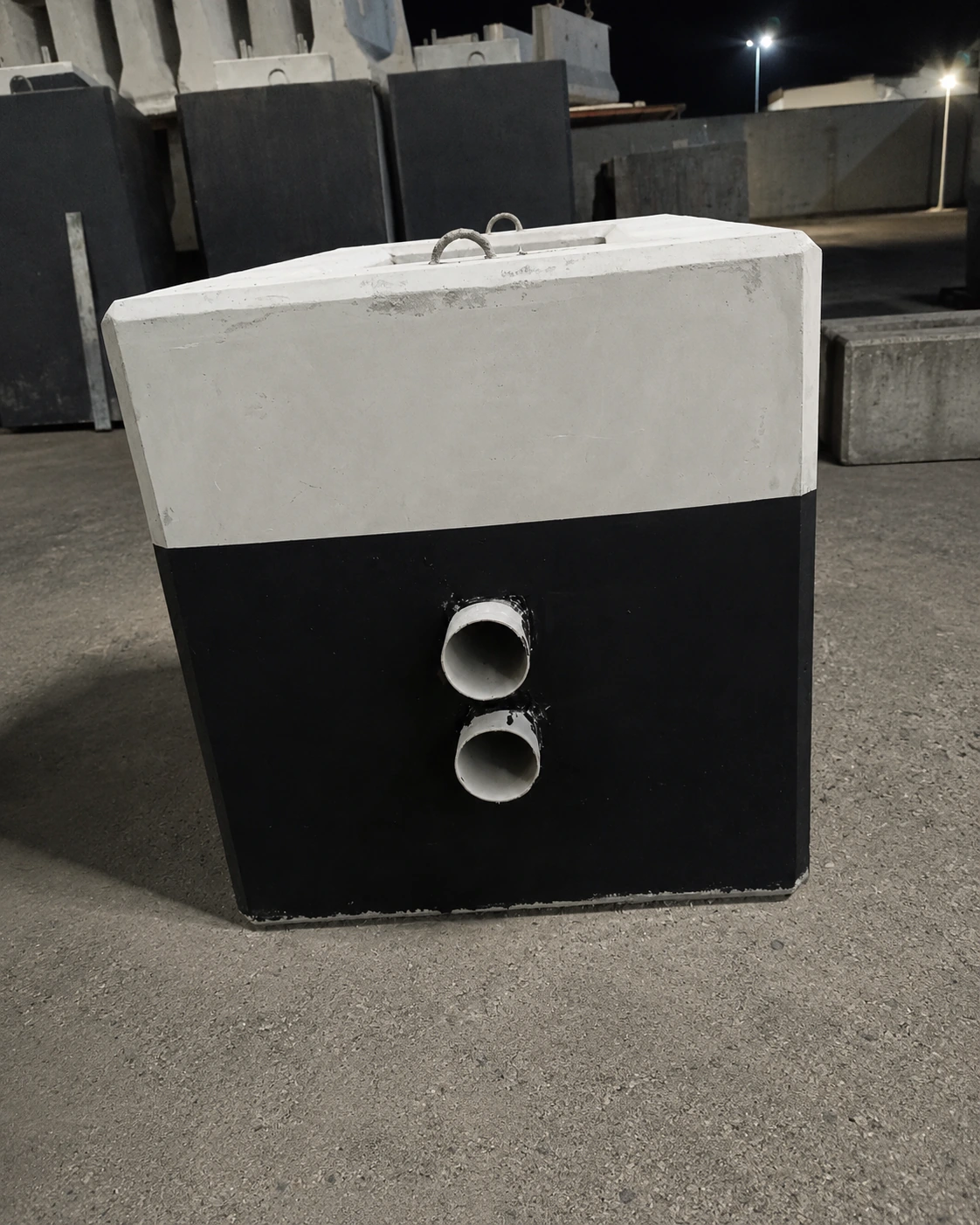 Precast Manhole and Cable Chamber with Conduit Openings in the UAE Precast cable chamber with twin conduit openings for underground utility installation in the UAE